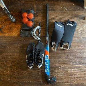 Feild hockey stick, balls, shin guards, goggles and sports bag